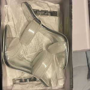 JLO heels worn once size mainly a silver heel ✨
